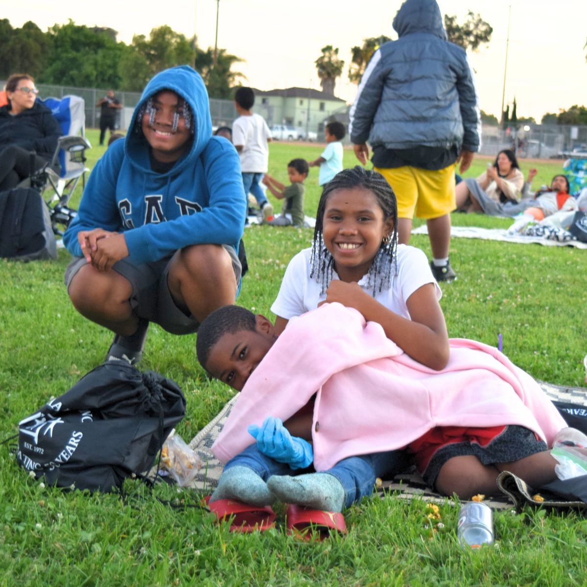 three kids at the park